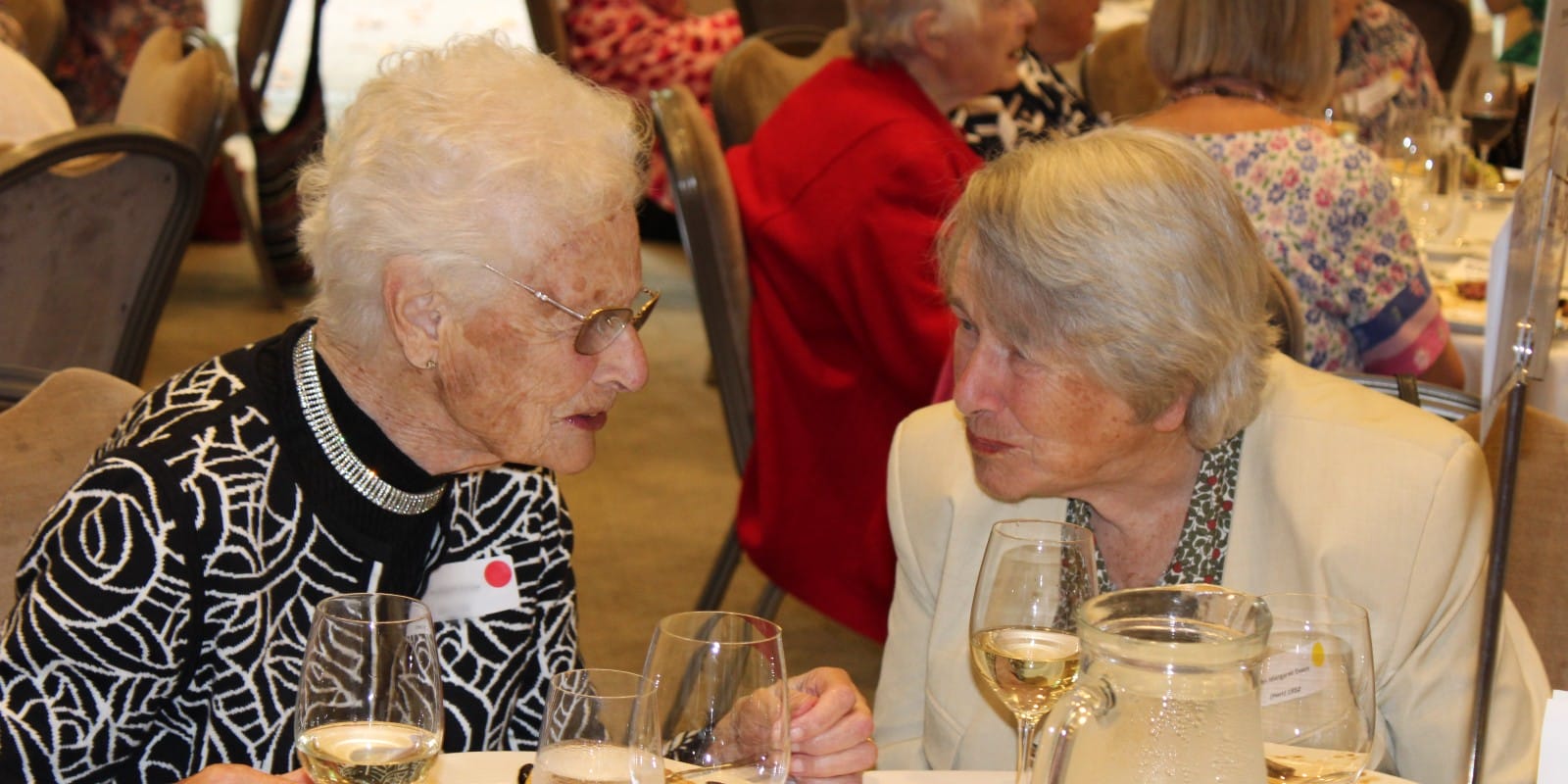 Two DOwne House Seniors in conversation at lunch