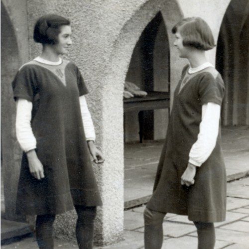 Girls wearing the Djibbah uniform in the Cloisters